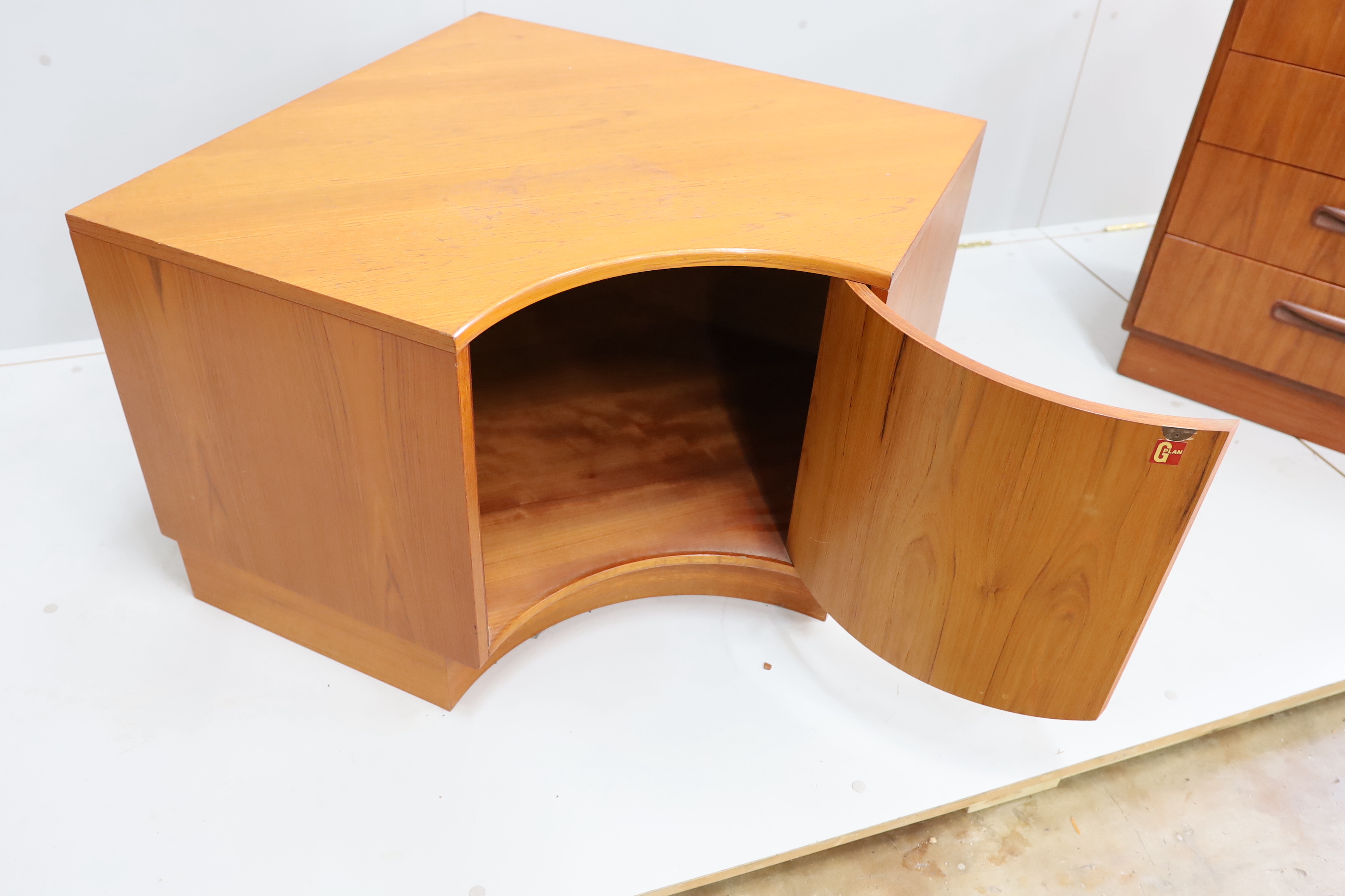 A mid century G Plan Fresco teak low corner cupboard, width 107cm, depth 87cm, height 54cm